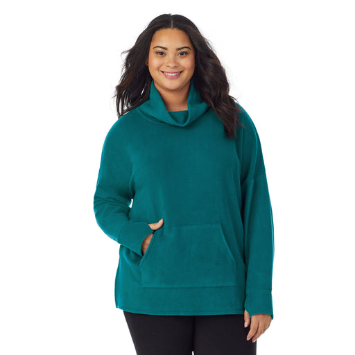 Teal Lagoon;Model is wearing size 1X. She is 5’11”, Bust 36”, Waist 36.5”, Hips 47.5”.@A lady wearing teal lagoon fleecewear with stretch lounge long sleeve tunic plus.
