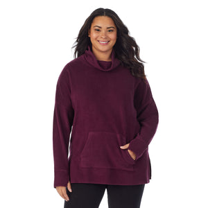 A lady wearing purple beet fleecewear with stretch lounge long sleeve tunic plus.