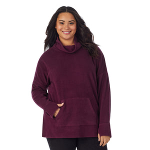 A lady wearing purple beet fleecewear with stretch lounge long sleeve tunic plus.
