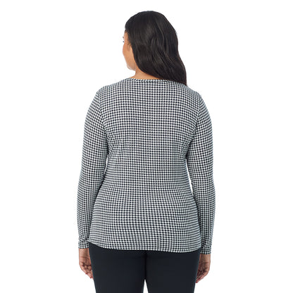 Ivory Houndstooth; Model is wearing size 1X. She is 5'11", Bust 36", Waist 36.5", Hips 47.5". @A lady wearing ivory houndstooth long sleeve v-neck plus softwer with stretch top.