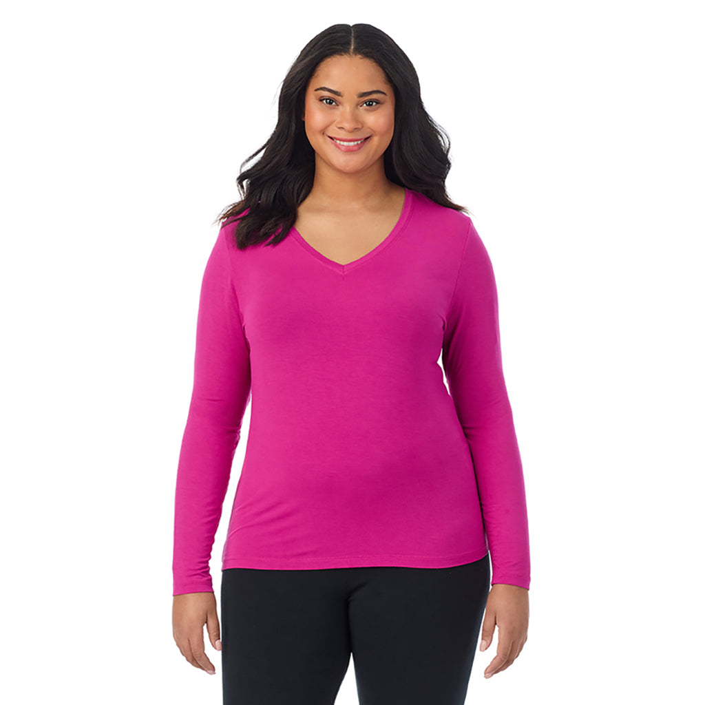 Deep Fuschia; Model is wearing size 1X. She is 5'11", Bust 36", Waist 36.5", Hips 47.5". @A lady wearing deep fuschia long sleeve v-neck plus softwer with stretch top.