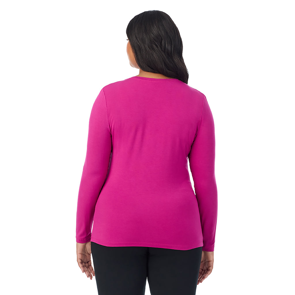 Deep Fuschia; Model is wearing size 1X. She is 5'11", Bust 36", Waist 36.5", Hips 47.5". @A lady wearing deep fuschia long sleeve v-neck plus softwer with stretch top.