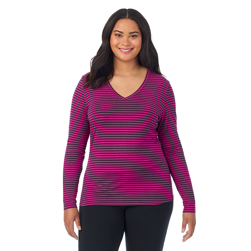 Fuchsia Stripe; Model is wearing size 1X. She is 5'11", Bust 36", Waist 36.5", Hips 47.5". @A lady wearing fuchsia stripe long sleeve v-neck plus softwer with stretch top.