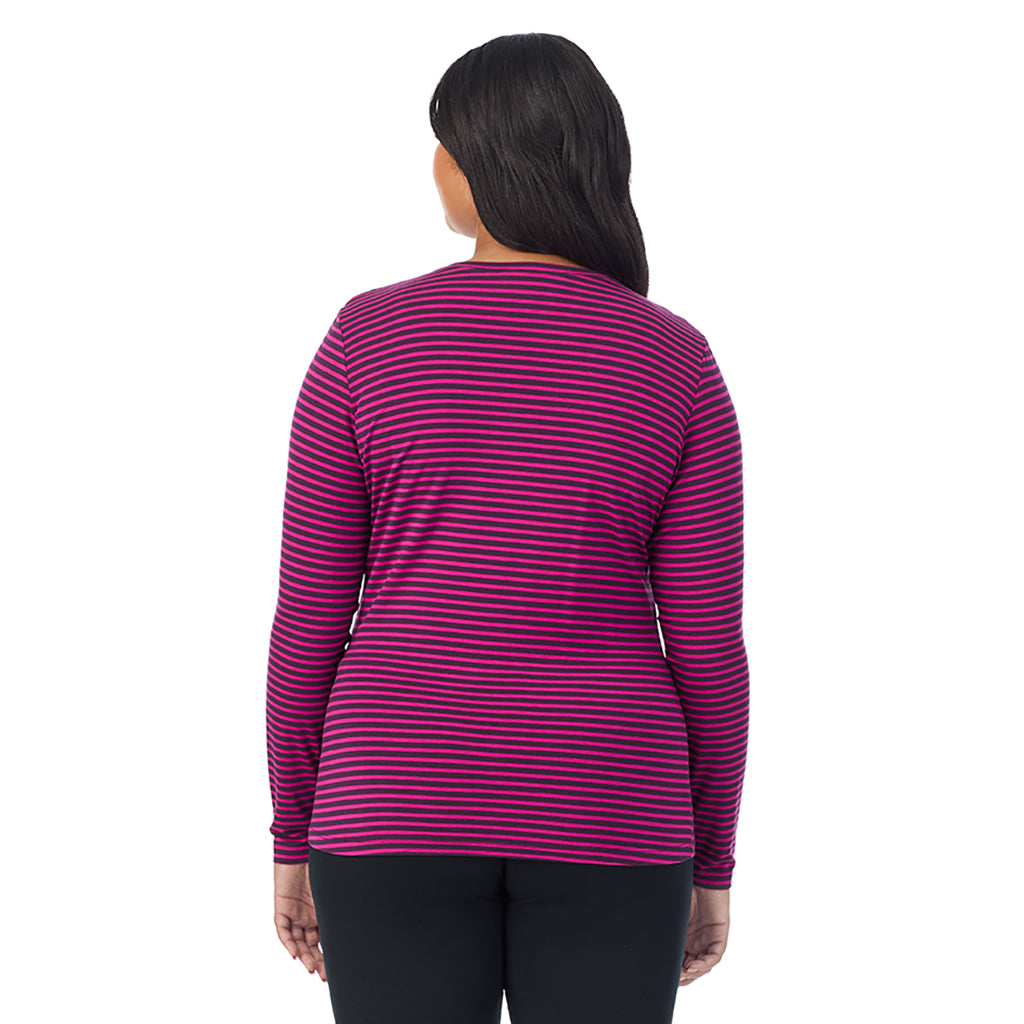 Fuchsia Stripe; Model is wearing size 1X. She is 5'11", Bust 36", Waist 36.5", Hips 47.5". @A lady wearing fuchsia stripe long sleeve v-neck plus softwer with stretch top.