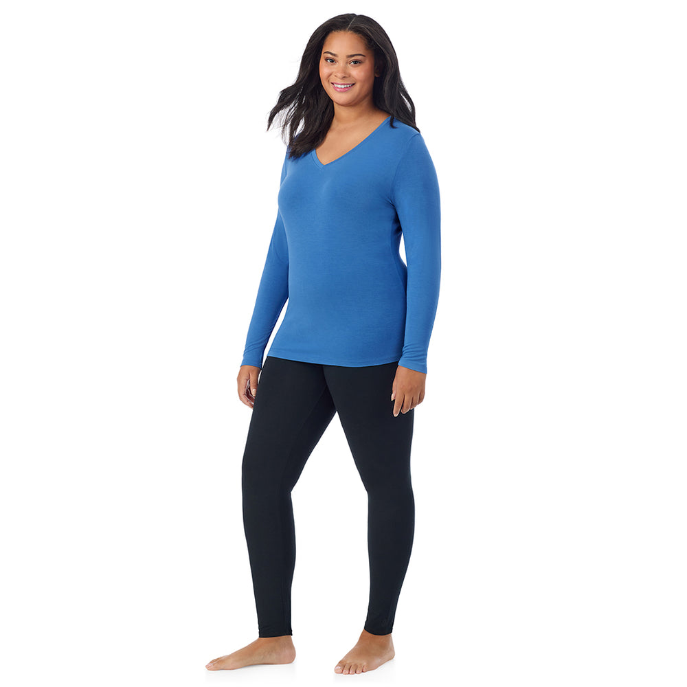 A lady wearing blue comet long sleeve v-neck plus softwer with stretch top.