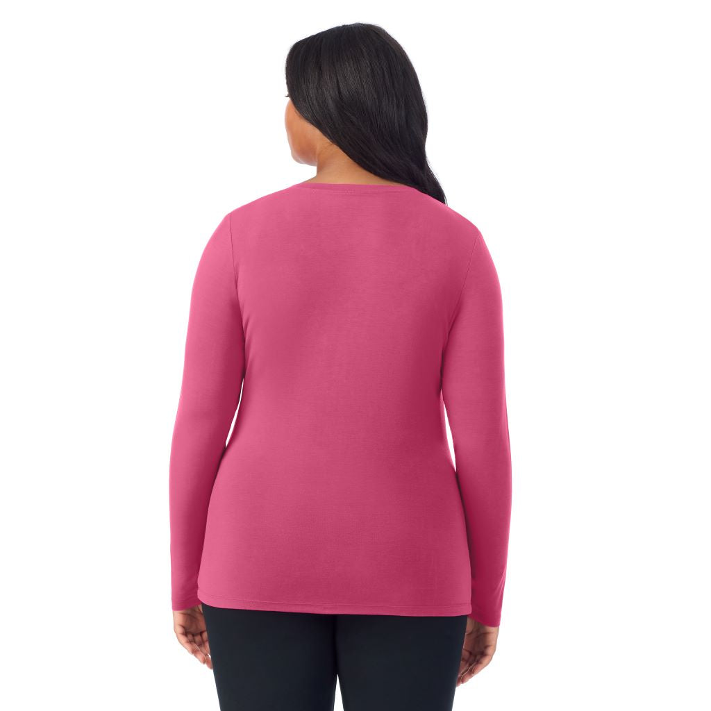 A lady wearing very berry long sleeve v-neck plus softwer with stretch top.
