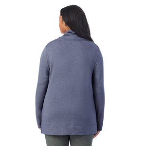 A lady wearing Ultra Cozy Long Sleeve Cowl Neck Tunic PLUS