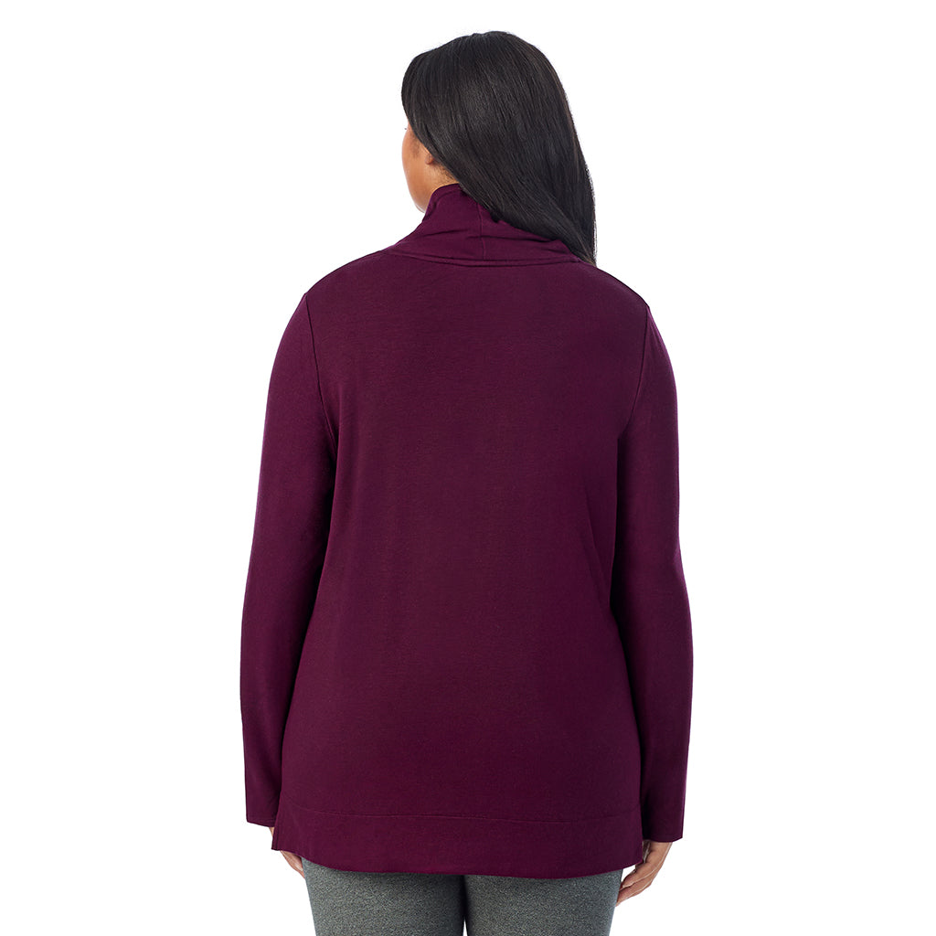 A lady wearing Ultra Cozy Long Sleeve Cowl Neck Tunic PLUS