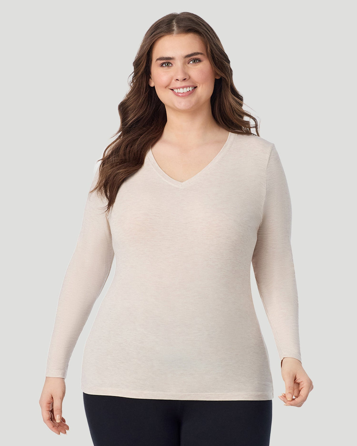  A Plus size lady wearing Oatmeal Heather Softwear With Stretch Long Sleeve V-Neck PLUS in a front view pose
