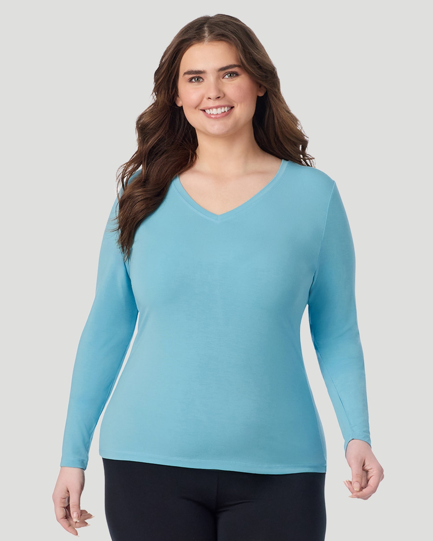  A Plus size lady wearing Cadet Blue Softwear With Stretch Long Sleeve V-Neck PLUS in a front view pose