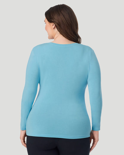  A Plus size lady wearing Cadet Blue Softwear With Stretch Long Sleeve V-Neck PLUS in a back view pose