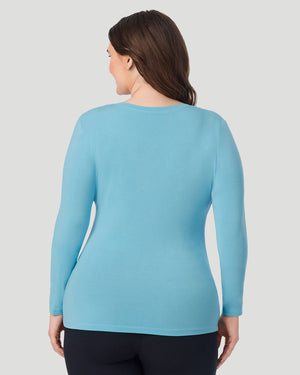  A Plus size lady wearing Cadet Blue Softwear With Stretch Long Sleeve V-Neck PLUS in a back view pose