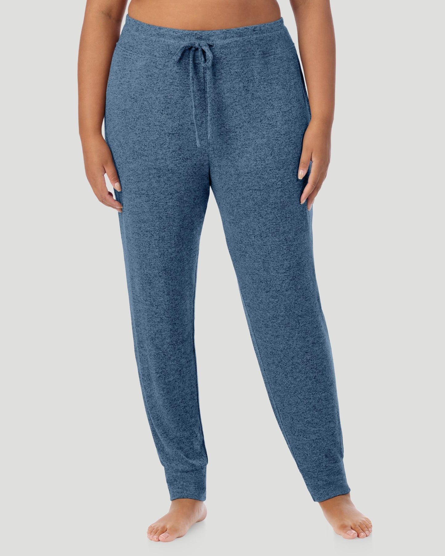 Deep Chambray; Model is wearing size S. She is 5'11", Bust 33", Waist 24", Hips 34". @A lady wearing a Deep Chambray SoftKnit Jogger PLUS in a front view look