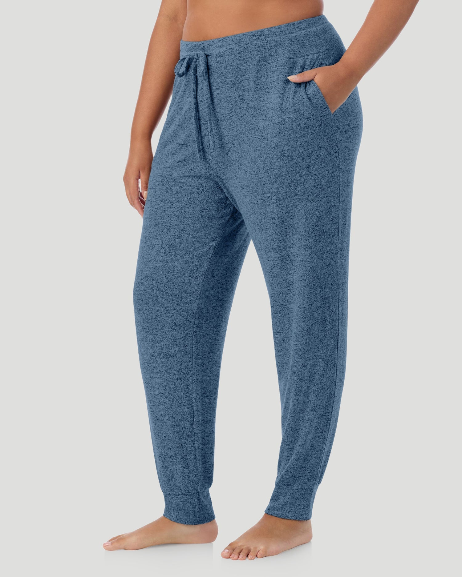 A lady wearing a Deep Chambray SoftKnit Jogger PLUS in a front view side angle look