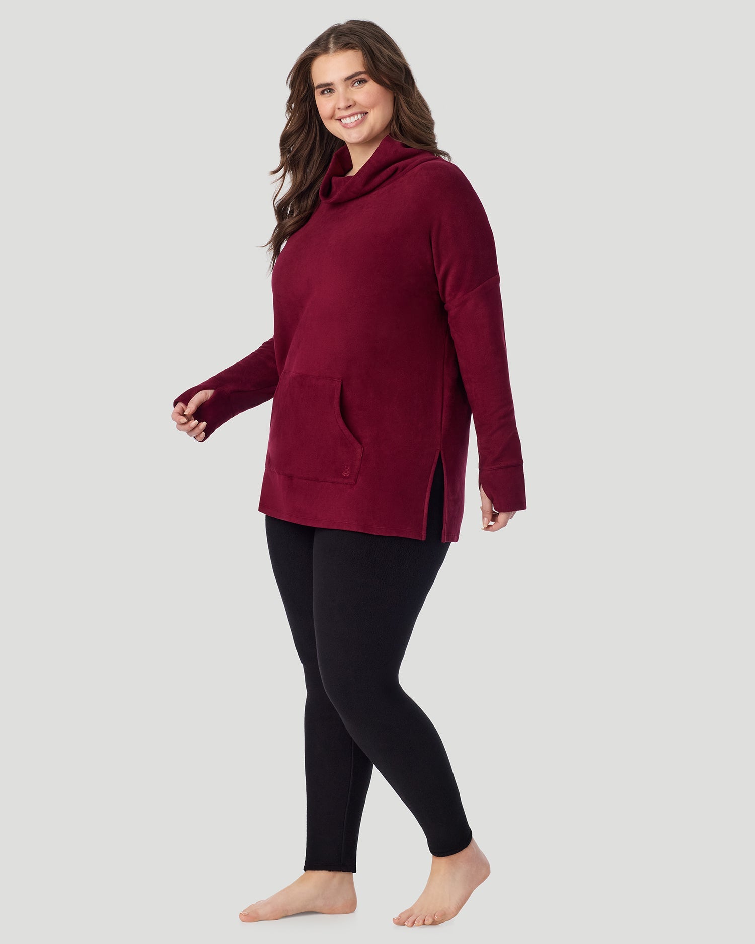 A lady wearing Fleecewear With Stretch Long Sleeve Tunic PLUS in Bordeaux