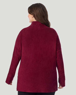 A plus size lady wearing Bordeaux Fleecewear With Stretch Long Sleeve Tunic PLUS in a back view pose