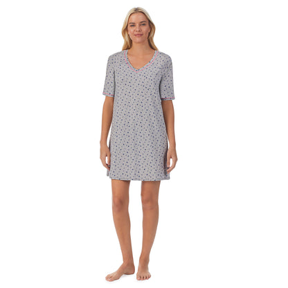 Heather Hearts; Model is wearing size S. She is 5'9", Bust 34", Waist 26", Hips 36".@ A lady wearingCuddl Smart Elbow Sleeve Sleep Tee with Heather Hearts print