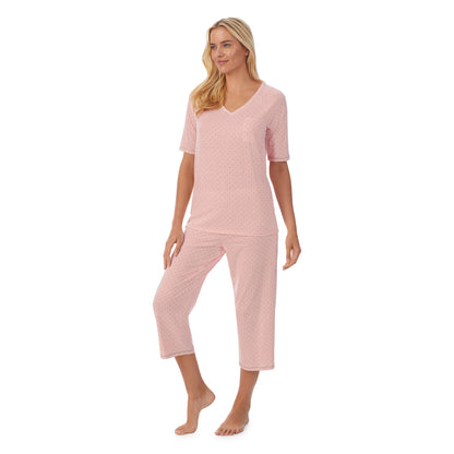 Dot;Model is wearing size S. She is 5'9", Bust 34", Waist 26", Hips 36".@ A lady wearingCuddl Smart Elbow Sleeve Top with Cropped Pant Pajama Set with Dot print