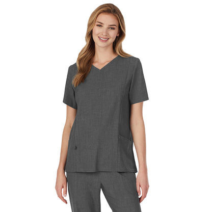 Charcoal Heather;A lady wearing charcoal heather scrub v-neck top with side pockets petite.