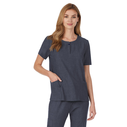 Navy Heather;@A lady wearing navy heather scrub henley neck top with side pockets petite.