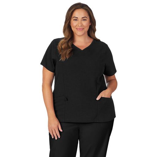 A lady wearing black scrub v-neck top with side pockets plus.