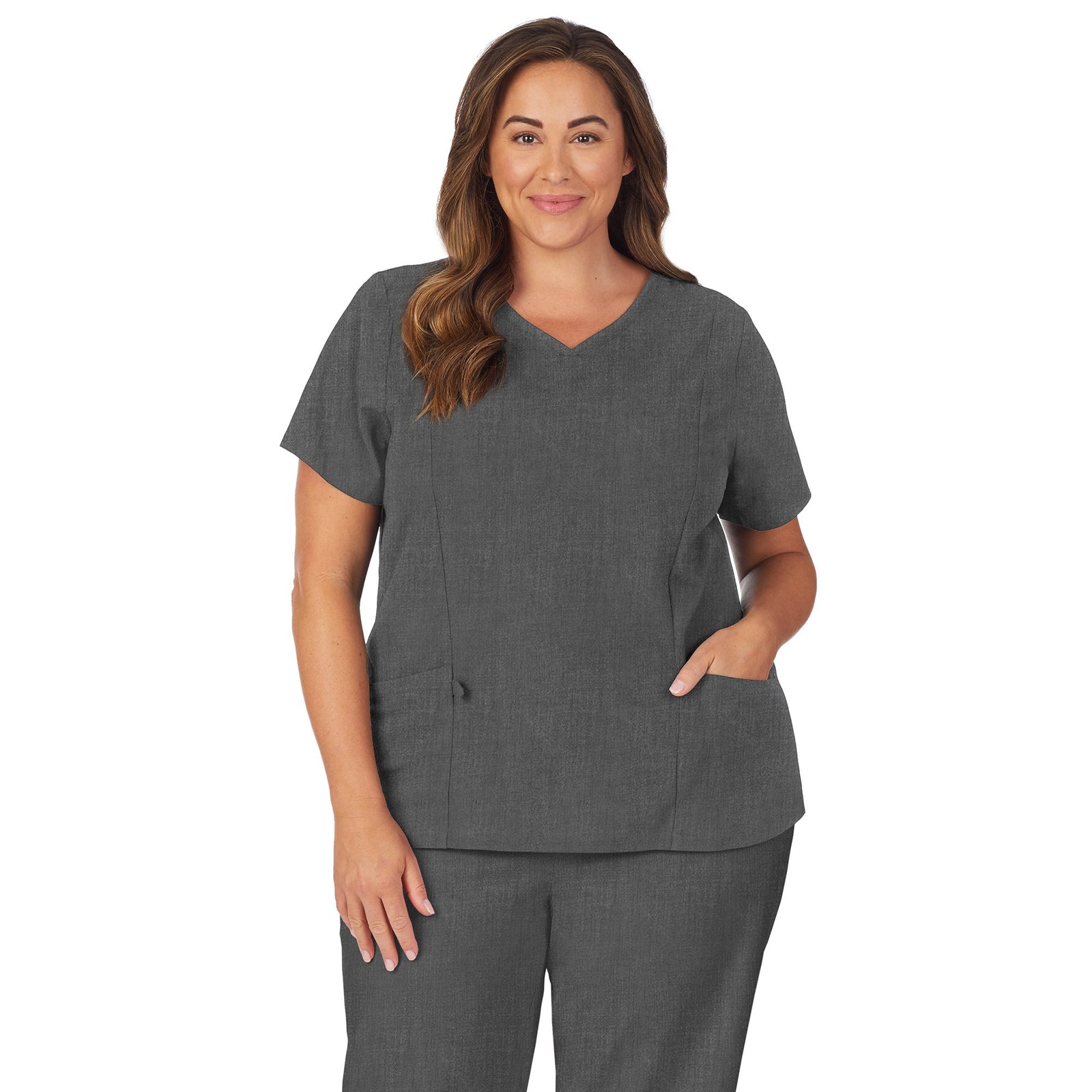Black;Model is wearing size 1X. She is 5’9.5”, Bust 43”, Waist 37”, Hips 49.5”.@A lady wearing black scrub v-neck top with side pockets plus.