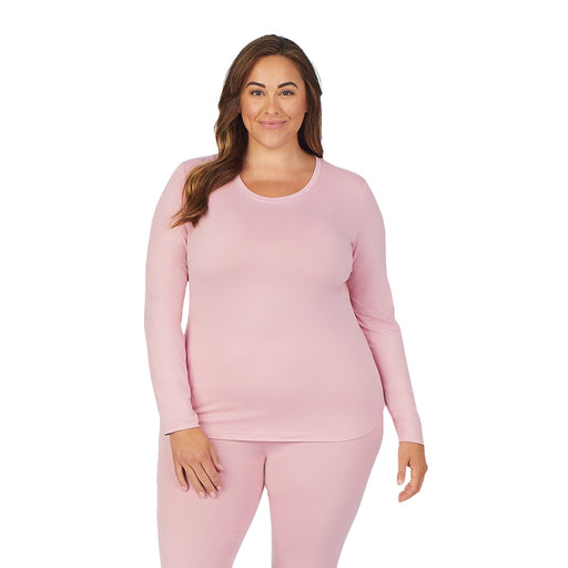 Cameo Pink;Model is wearing size 1X. She is 5’9.5”, Bust 43”, Waist 37”, Hips 49.5”.@A lady wearing cameo pink long sleeve underscrub crew neck top plus.