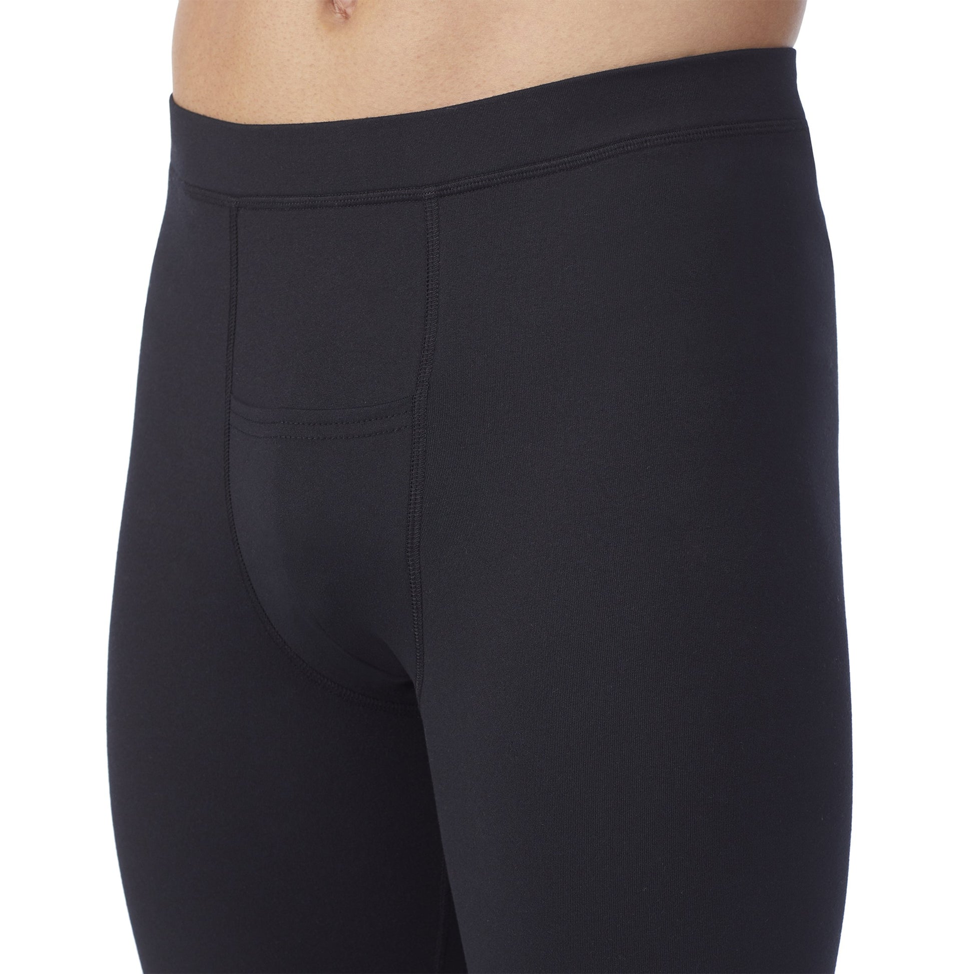 A man wearing black Far Infrared Enhance Pant