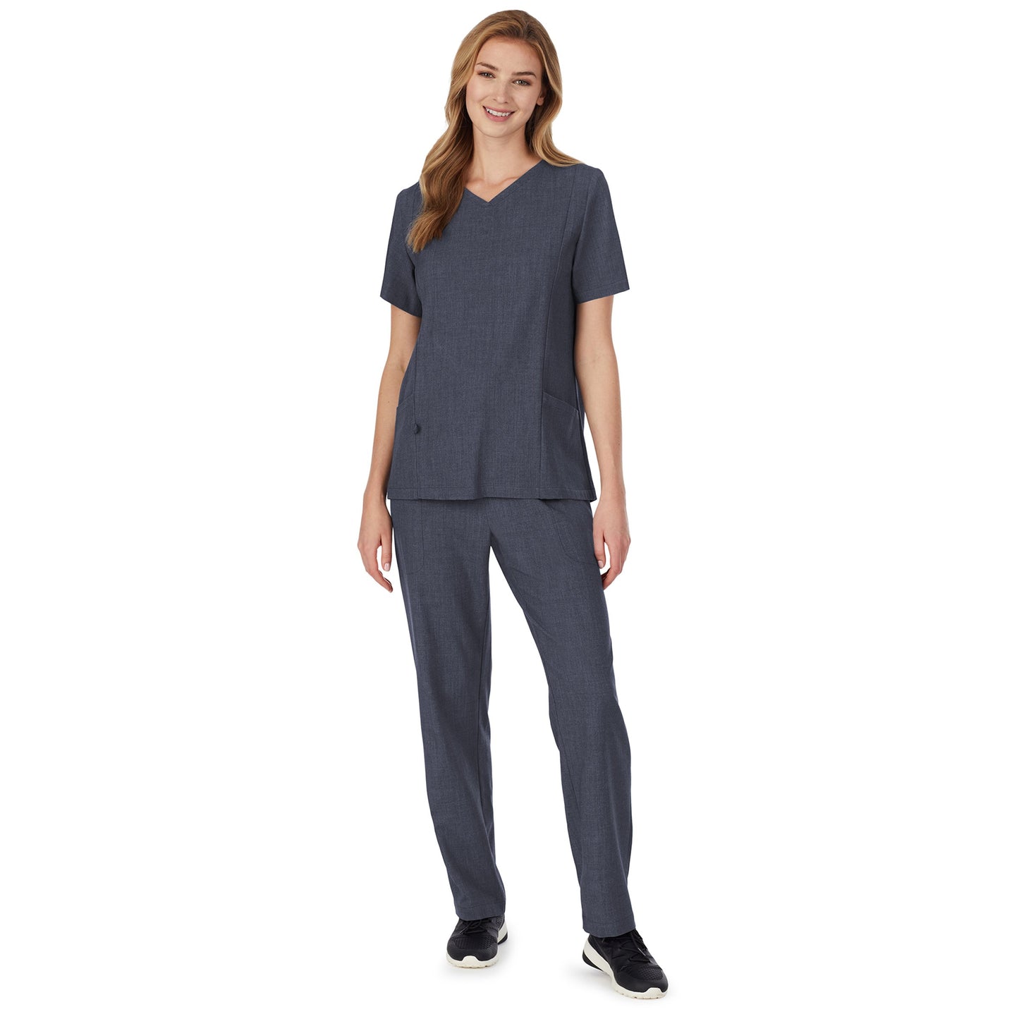 Navy Heather;A lady wearing navy heather scrub v-neck top with side pockets petite.