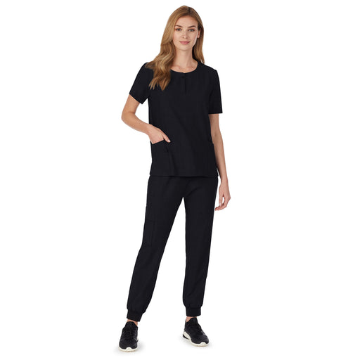 Black;@A lady wearing black scrub henley neck top with side pockets petite.