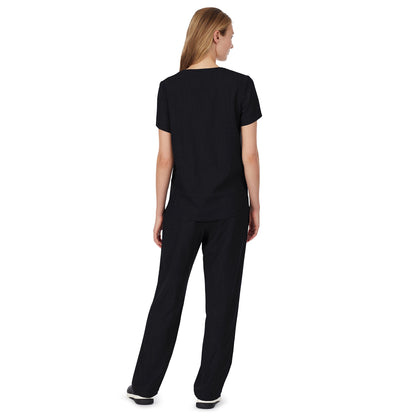Black;Model is wearing size S. She is 5’9”, Bust 32”, Waist 23", Hips 34.5”.@A lady wearing black short sleeve scrub v-neck top with chest pocket.