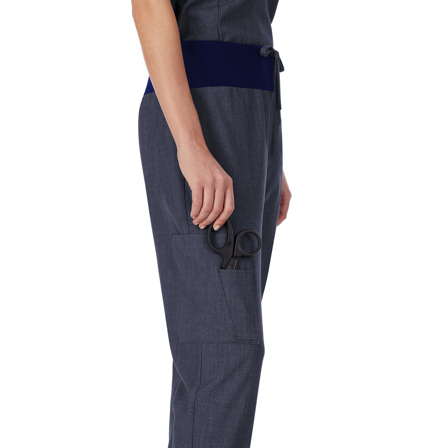 Navy Heather;Model is wearing size S. She is 5’9”, Bust 32”, Waist 23", Hips 34.5”.@A lady wearing Navy Heather scrub jogger pant.