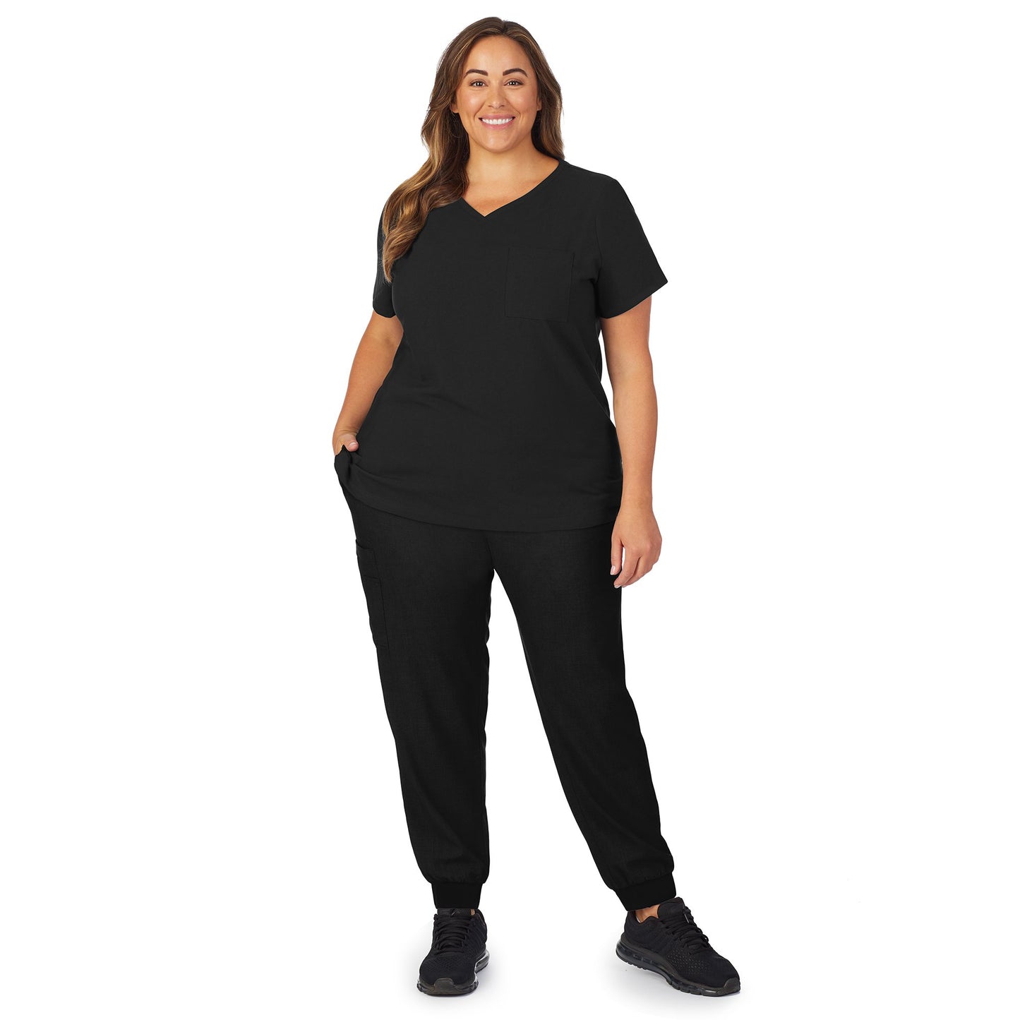 Black;Model is wearing size 1X. She is 5’9.5”, Bust 43”, Waist 37”, Hips 49.5”.@A lady wearing black scrub v-neck top with chest pocket plus.