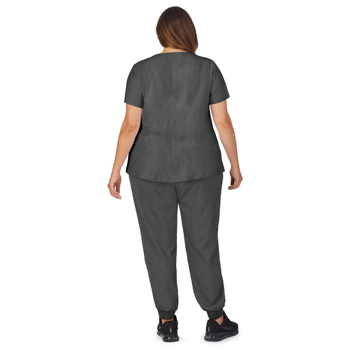 Charcoal Heather;Model is wearing size 1X. She is 5’9.5”, Bust 43”, Waist 37”, Hips 49.5”.@A lady wearing charcoal heather scrub henley neck top with side pockets plus.