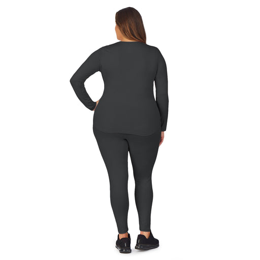 Charcoal;Model is wearing size 1X. She is 5’9.5”, Bust 43”, Waist 37”, Hips 49.5”.@A lady wearing Charcoal underscrub legging plus.