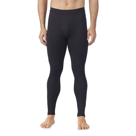 A man wearing black Far Infrared Enhance Pant