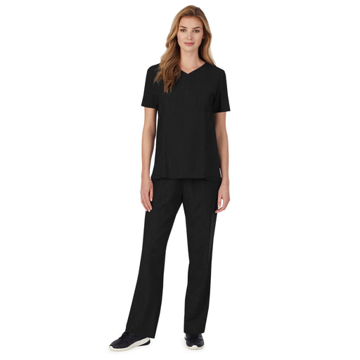 Black;@A lady wearing black scrub v-neck top with chest pocket petite.