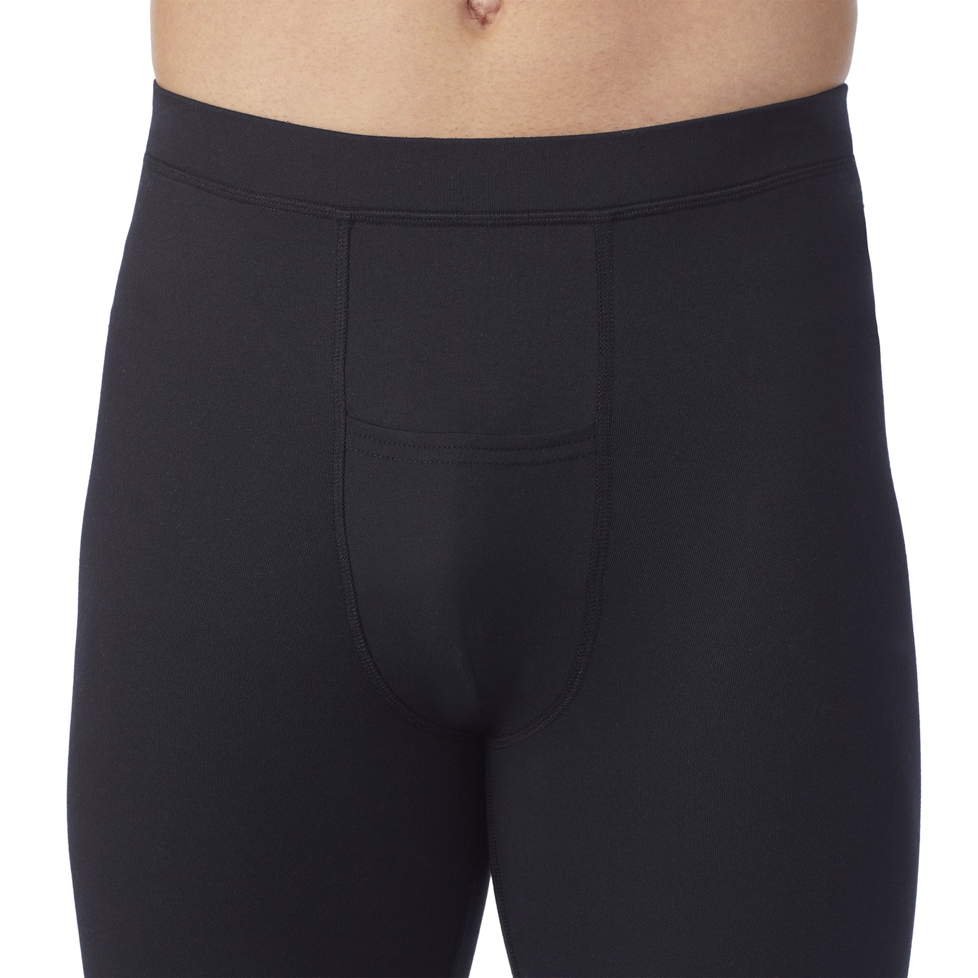 A man wearing black Far Infrared Enhance Pant