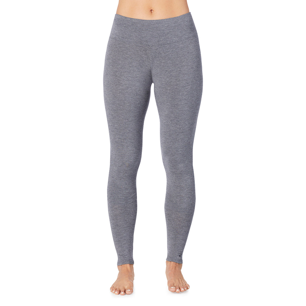 A lady wearing charcoal heather high waist legging petite.