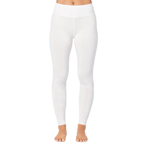 A lady wearing ivory high waist legging petite.