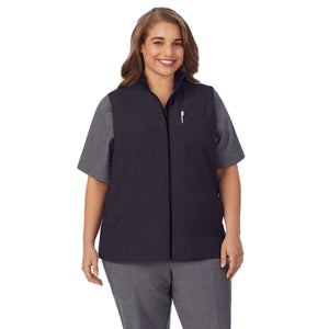 A lady wearing black scrub vest plus.