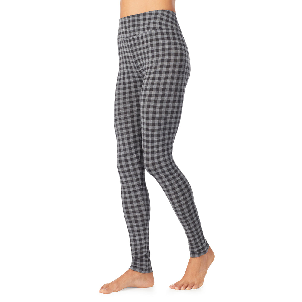 A lady wearing a tonal buffalo high waist legging.