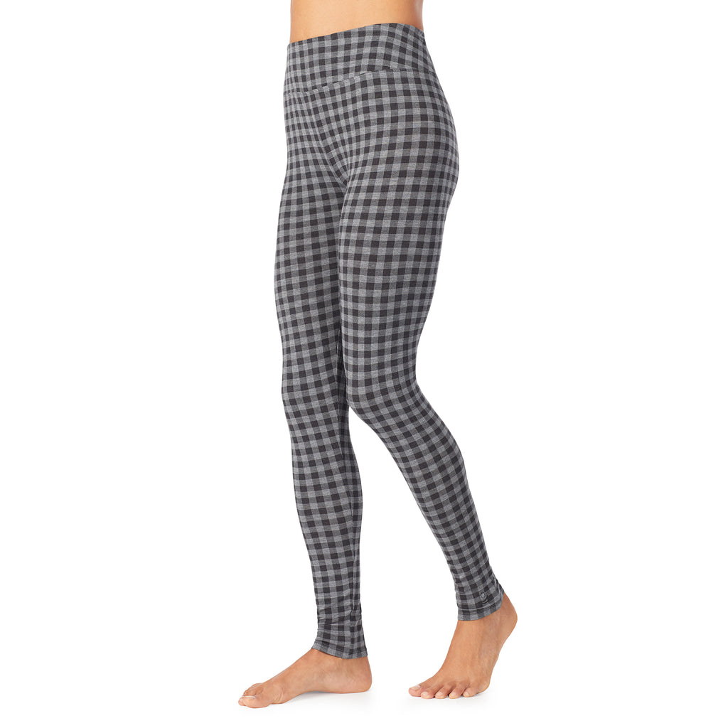 A lady wearing a tonal buffalo high waist legging.