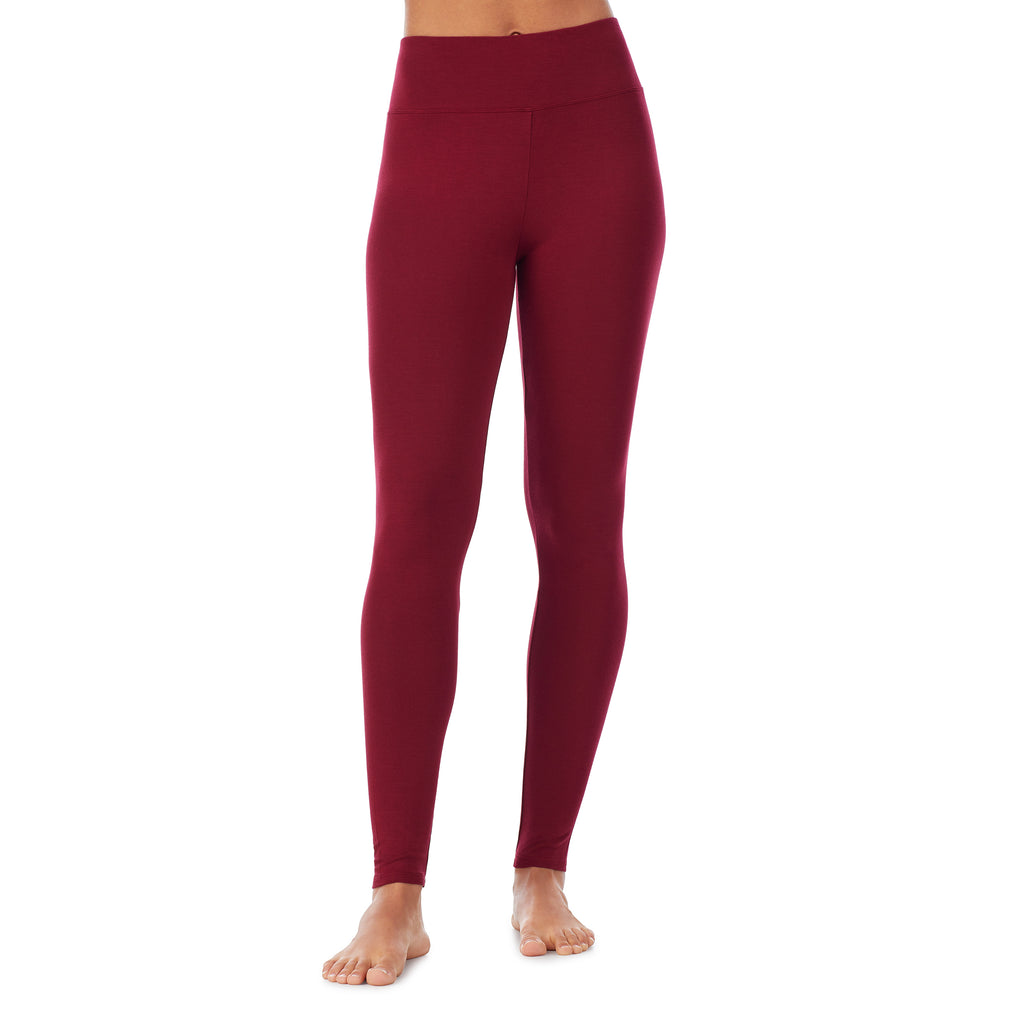 A lady wearing a rhubarb high waist legging.