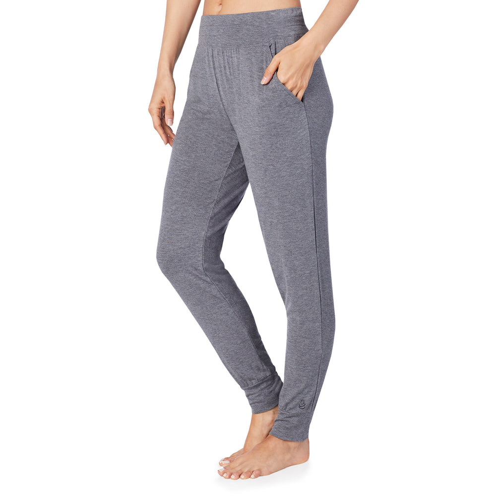 A lady wearing a charcoal heather jogger.