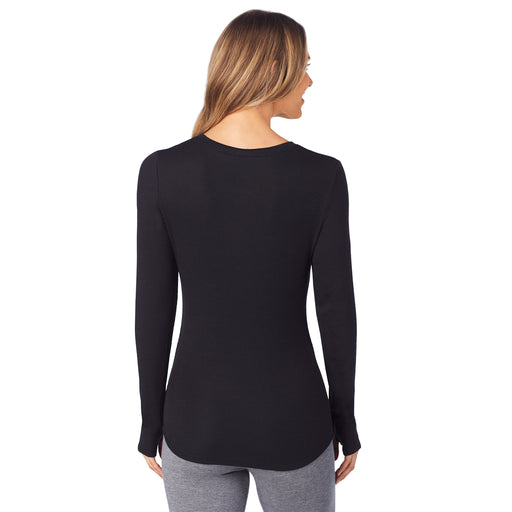 Black; Model is wearing size S. She is 5’9”, Bust 32”, Waist 25.5”, Hips 36”. @A lady wearing a black  ribbed long sleeve henley.