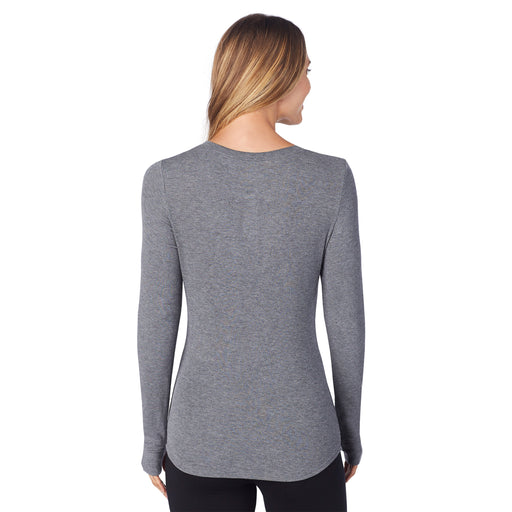 Charcoal Heather; Model is wearing size S. She is 5’9”, Bust 32”, Waist 25.5”, Hips 36”. @A lady wearing a charcoal heather ribbed long sleeve henley.
