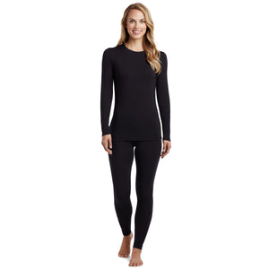 A lady wearing a black long sleeve stretch crew PETITE.