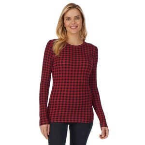 A lady wearing a red buffalo long sleeve stretch crew PETITE.