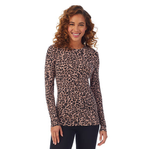 A lady wearing a animal long sleeve stretch crew PETITE.